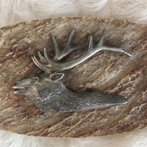 Handcrafted belt buckle.